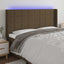 sengegavl med LED-lys 183x16x118/128 cm stof mørkebrun