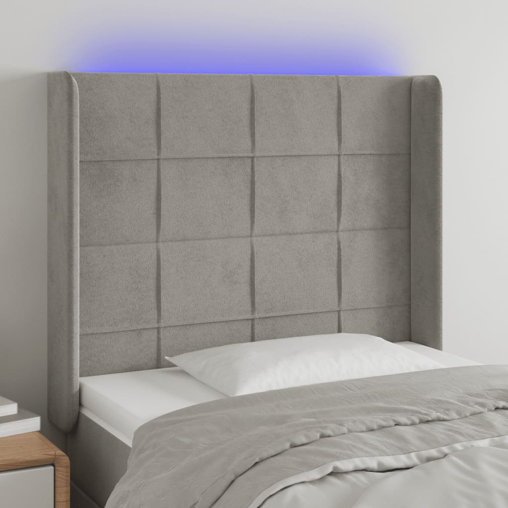 sengegavl med LED-lys 93x16x118/128 cm fløjl lysegrå