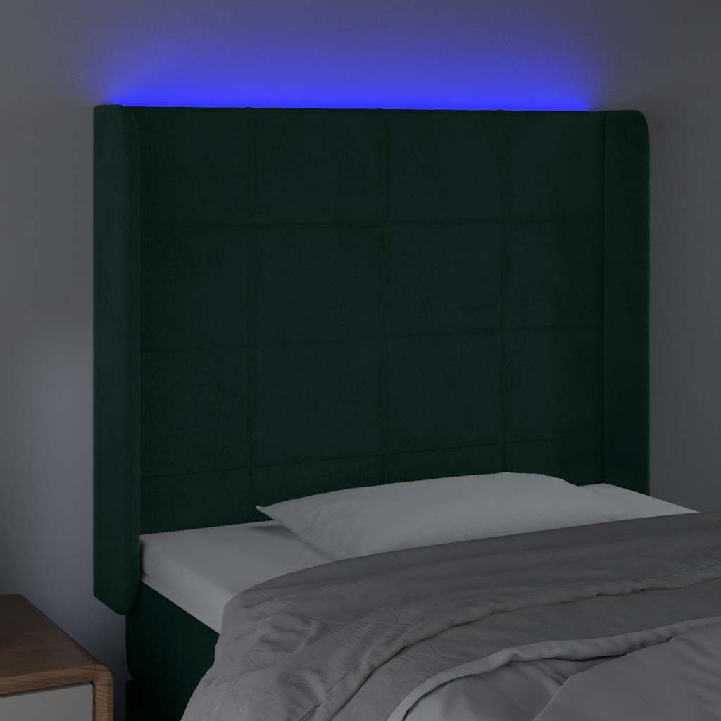 sengegavl med LED-lys 103x16x118/128 cm fløjl mørkegrøn
