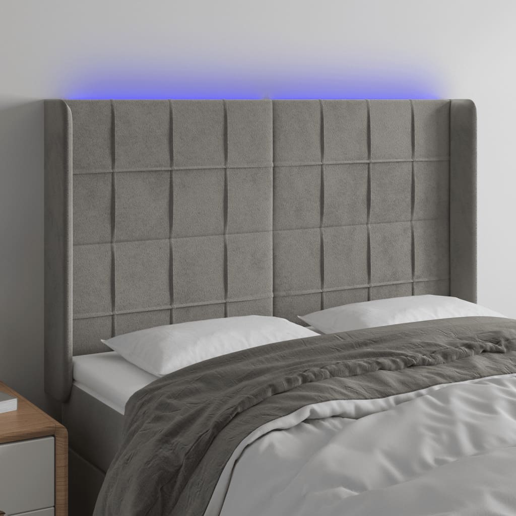 sengegavl med LED-lys 147x16x118/128 cm fløjl lysegrå