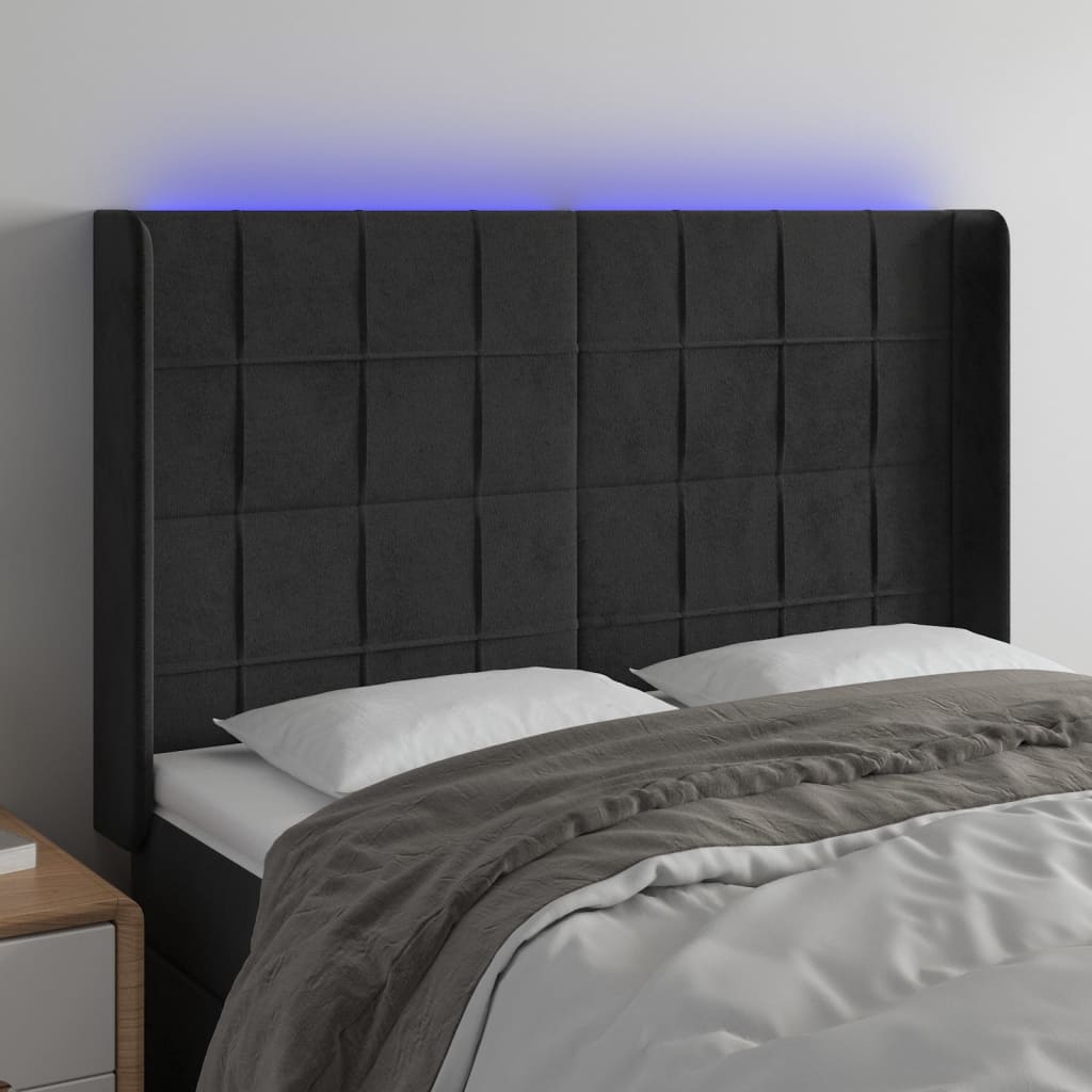 sengegavl med LED-lys 147x16x118/128 cm fløjl sort