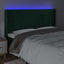 sengegavl med LED-lys 163x16x118/128 cm fløjl mørkegrøn