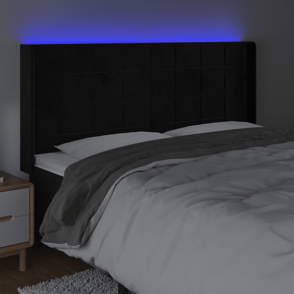 sengegavl med LED-lys 203x16x118/128 cm fløjl sort