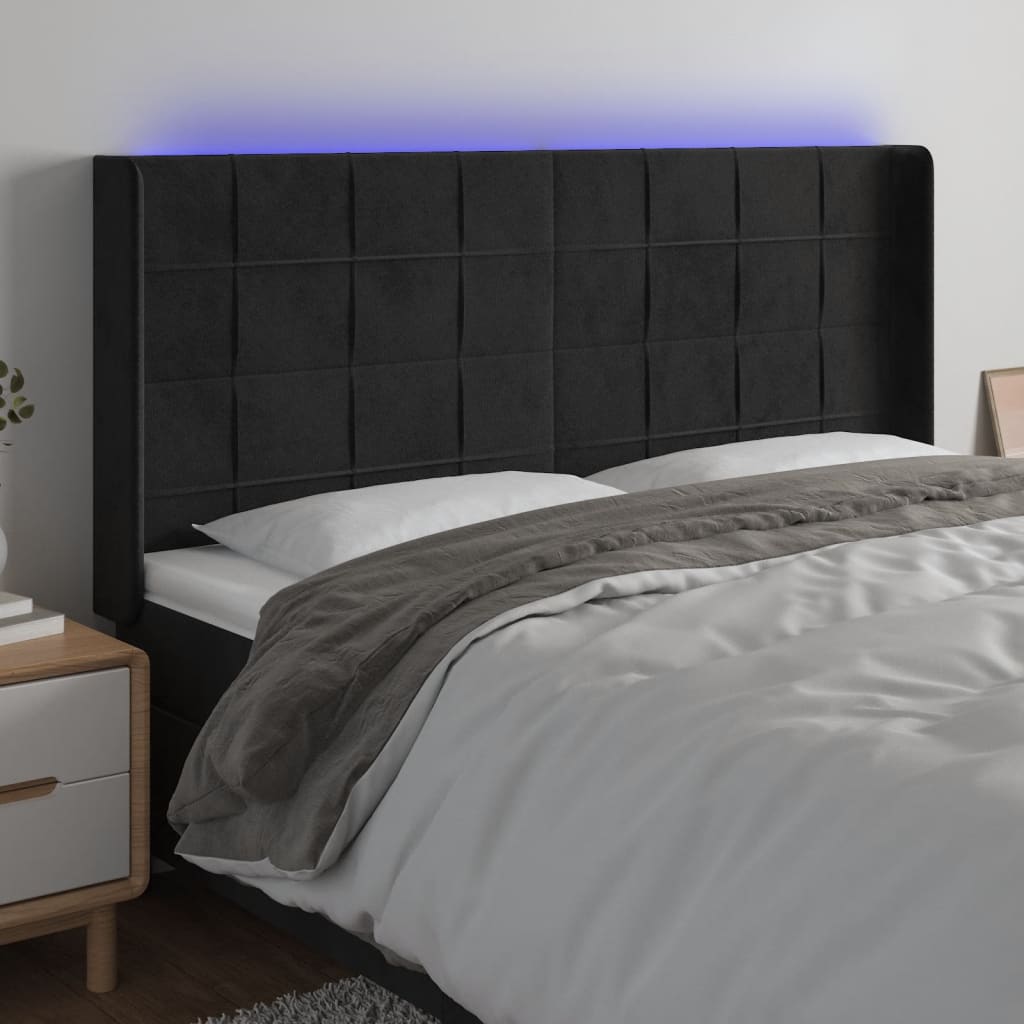 sengegavl med LED-lys 203x16x118/128 cm fløjl sort