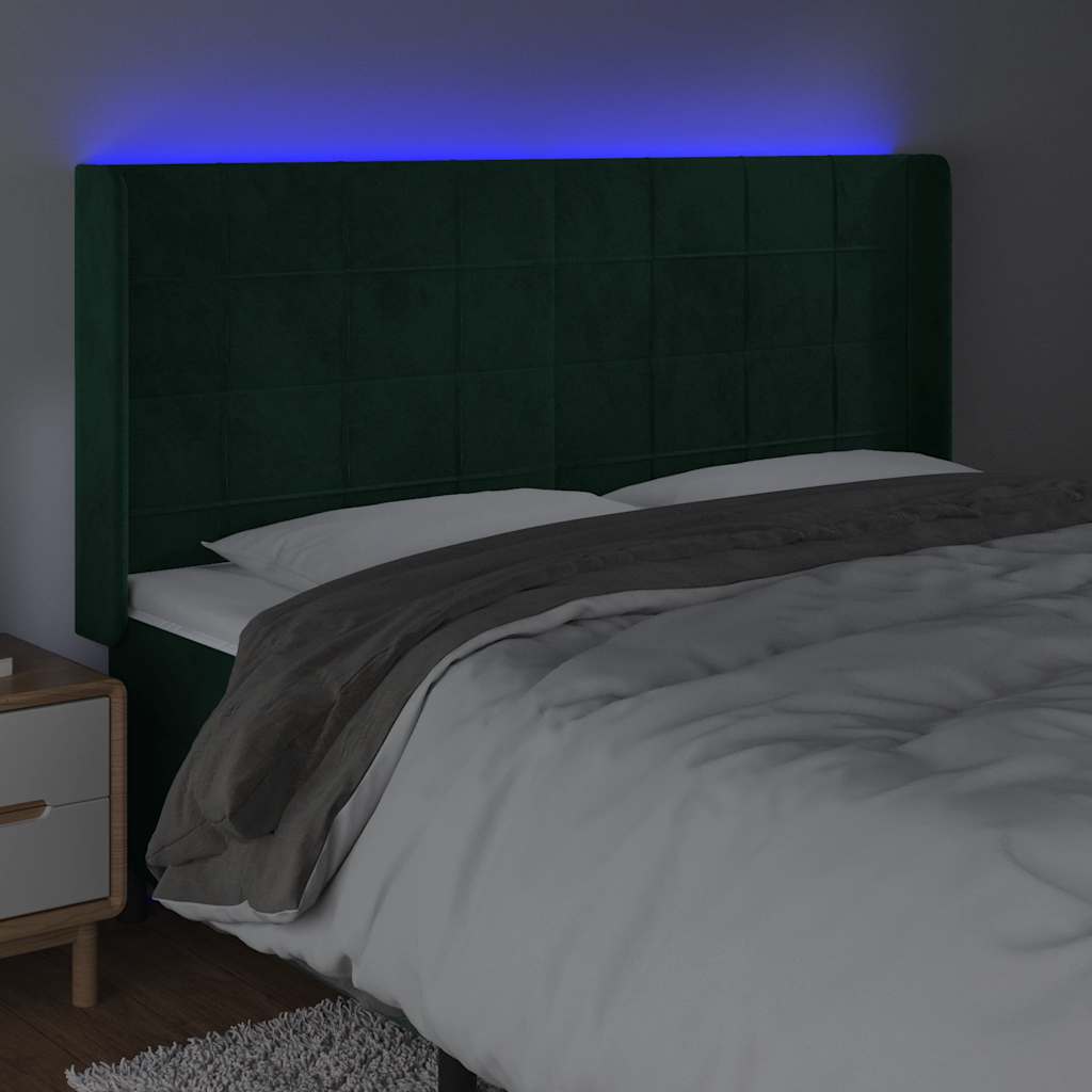 sengegavl med LED-lys 203x16x118/128 cm fløjl mørkegrøn