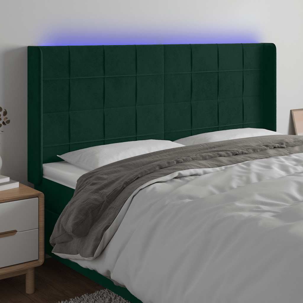 sengegavl med LED-lys 203x16x118/128 cm fløjl mørkegrøn