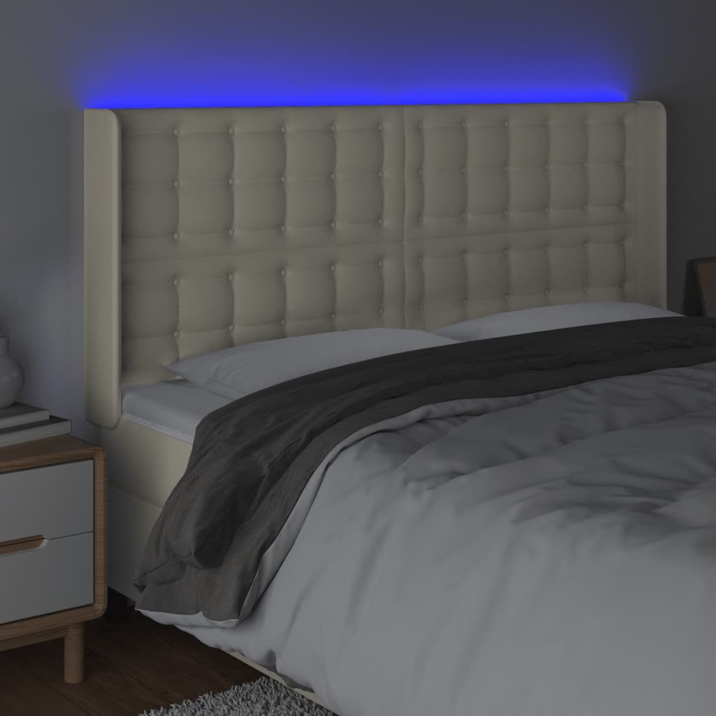 sengegavl med LED-lys 147x16x118/128 cm kunstlæder cremefarvet