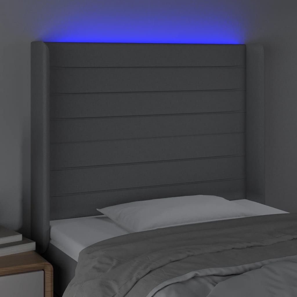 sengegavl med LED-lys 83x16x118/128 cm stof lysegrå