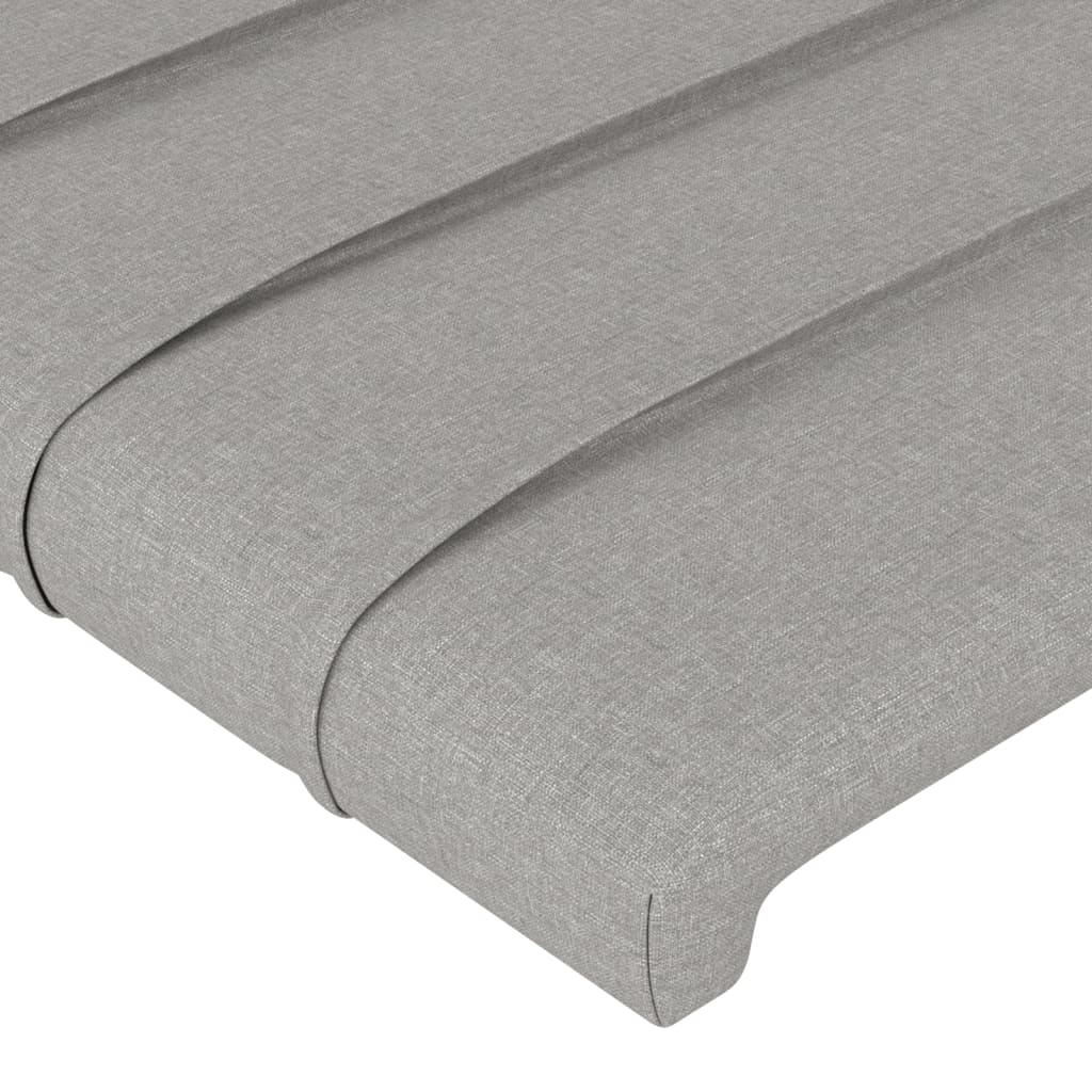 sengegavl med LED-lys 83x16x118/128 cm stof lysegrå