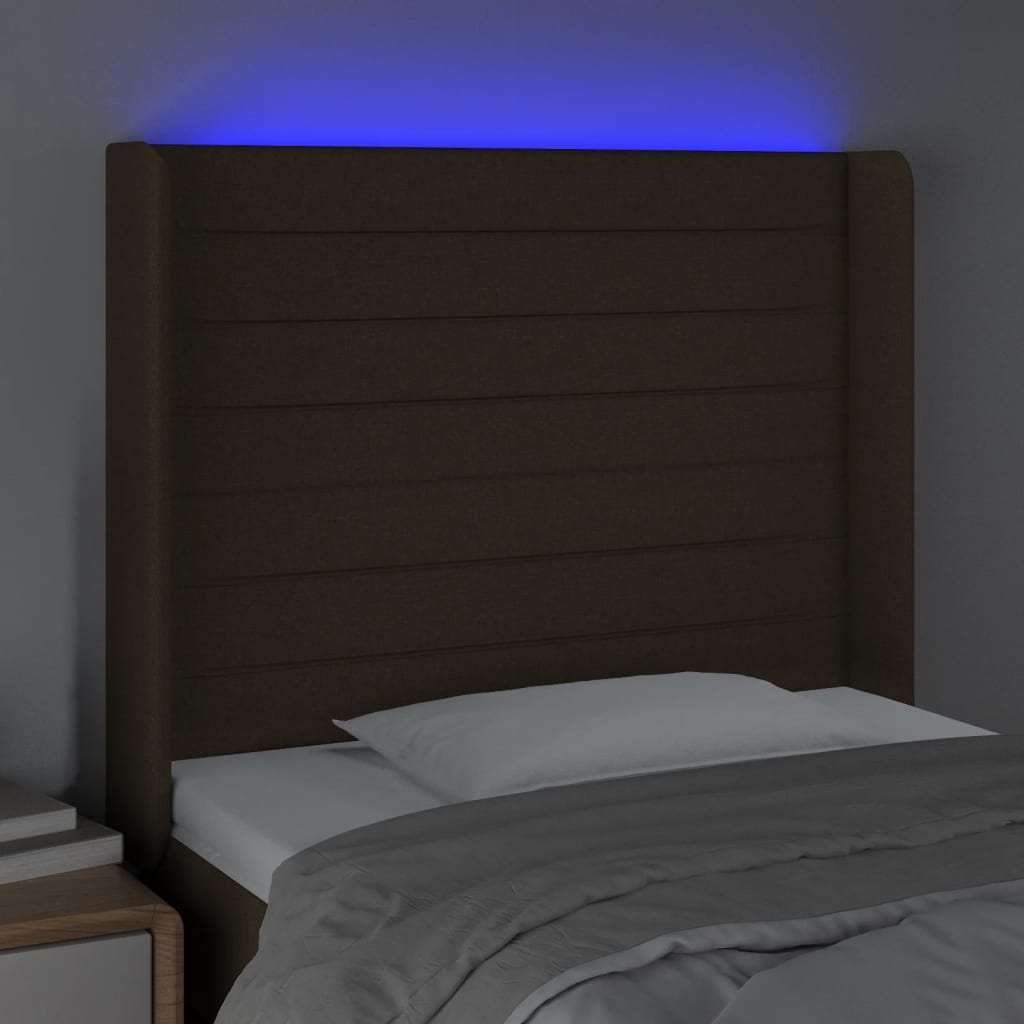 sengegavl med LED-lys 83x16x118/128 cm stof mørkebrun