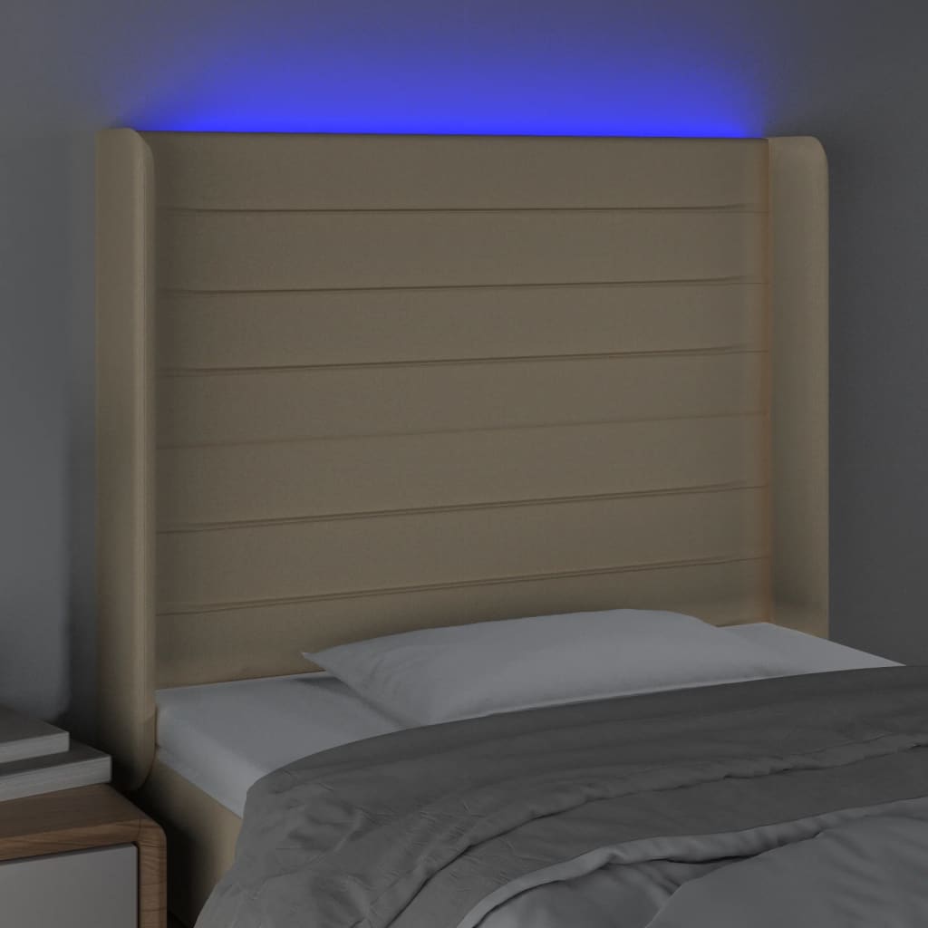 sengegavl med LED-lys 103x16x118/128 cm stof cremefarvet