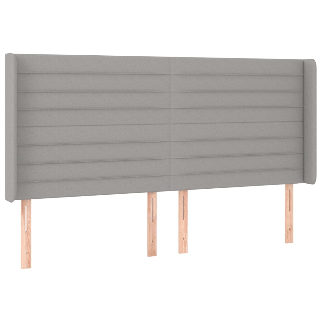 sengegavl med LED-lys 163x16x118/128 cm stof lysegrå