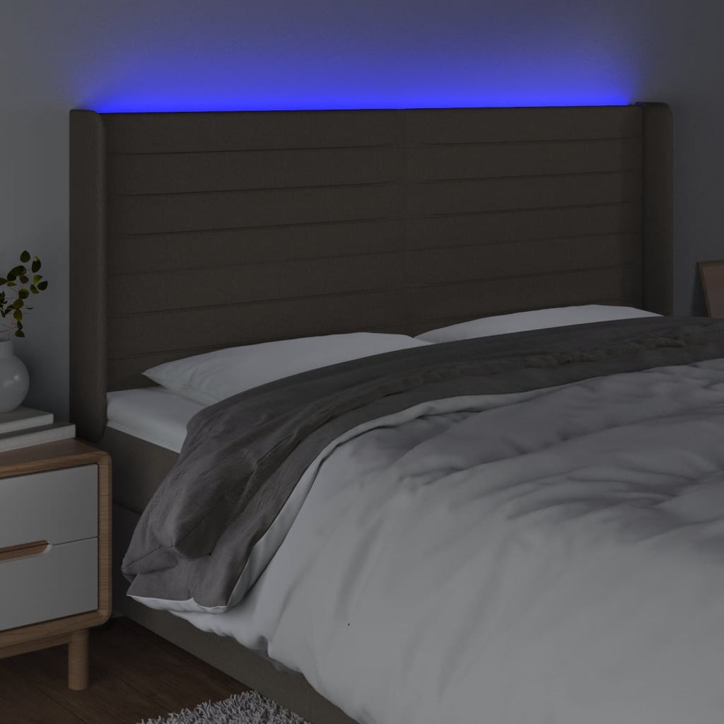sengegavl med LED-lys 163x16x118/128 cm stof gråbrun