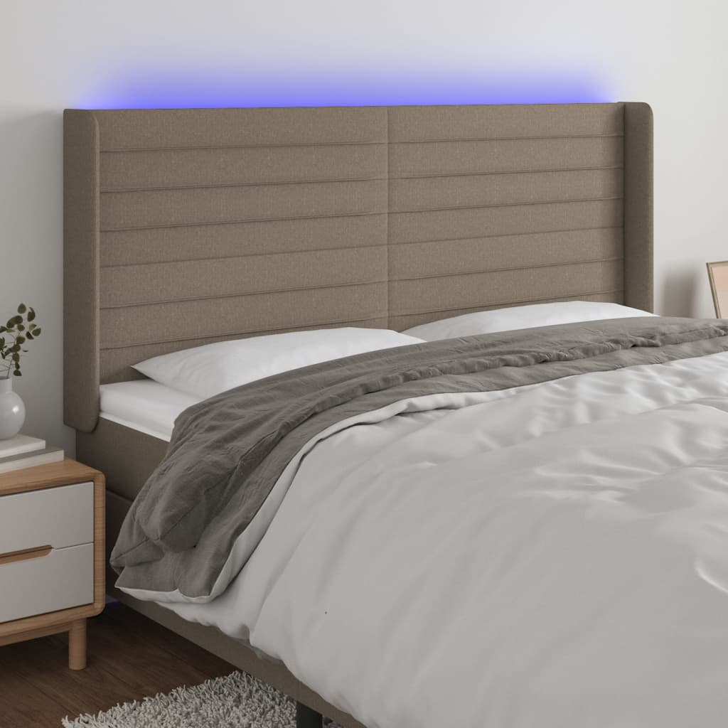 sengegavl med LED-lys 163x16x118/128 cm stof gråbrun