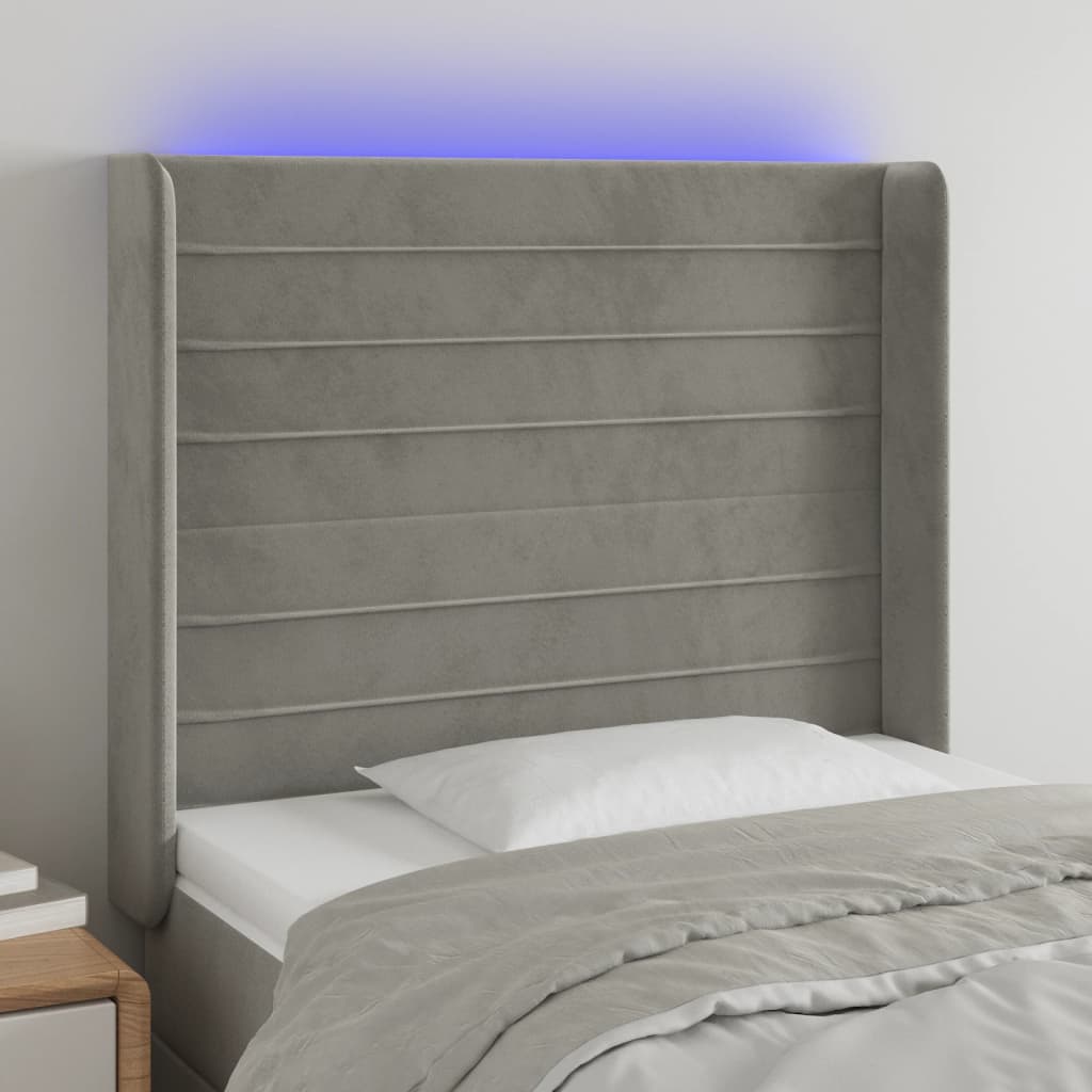 sengegavl med LED-lys 83x16x118/128 cm fløjl lysegrå