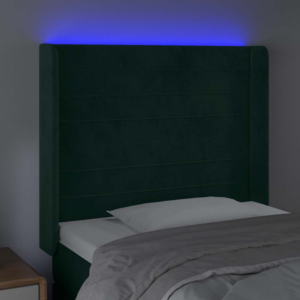sengegavl med LED-lys 83x16x118/128 cm fløjl mørkegrøn