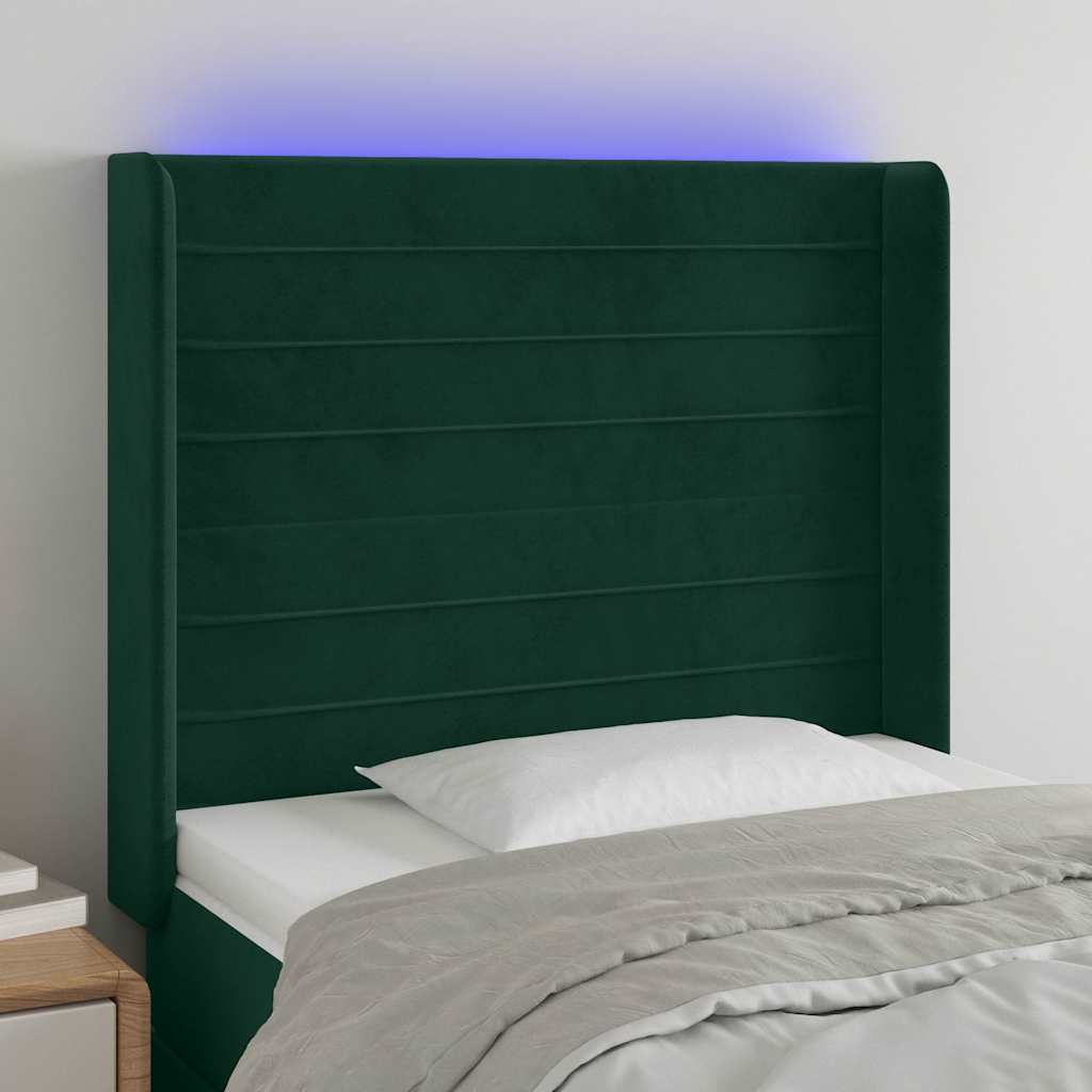 sengegavl med LED-lys 103x16x118/128 cm fløjl mørkegrøn
