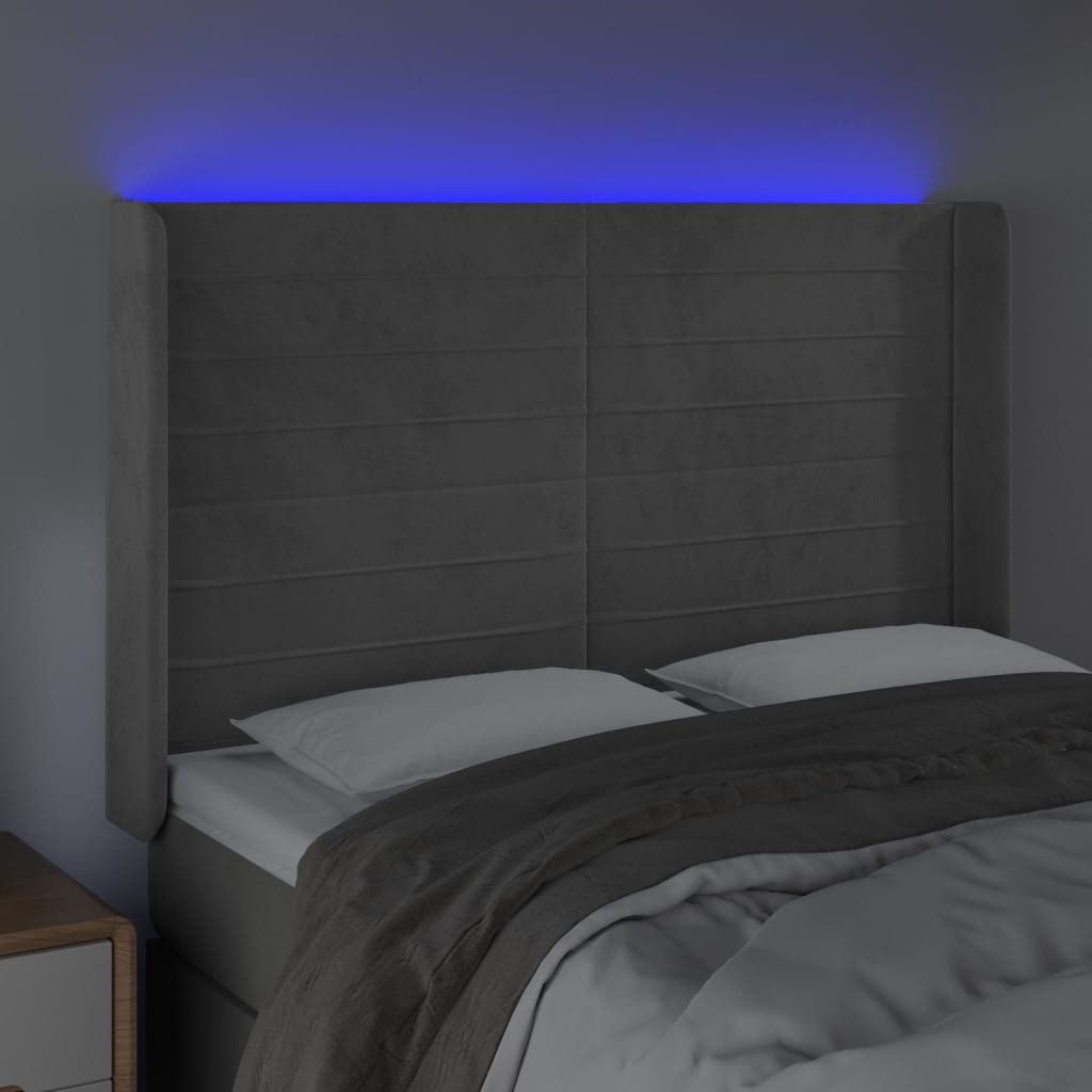sengegavl med LED-lys 147x16x118/128 cm fløjl lysegrå