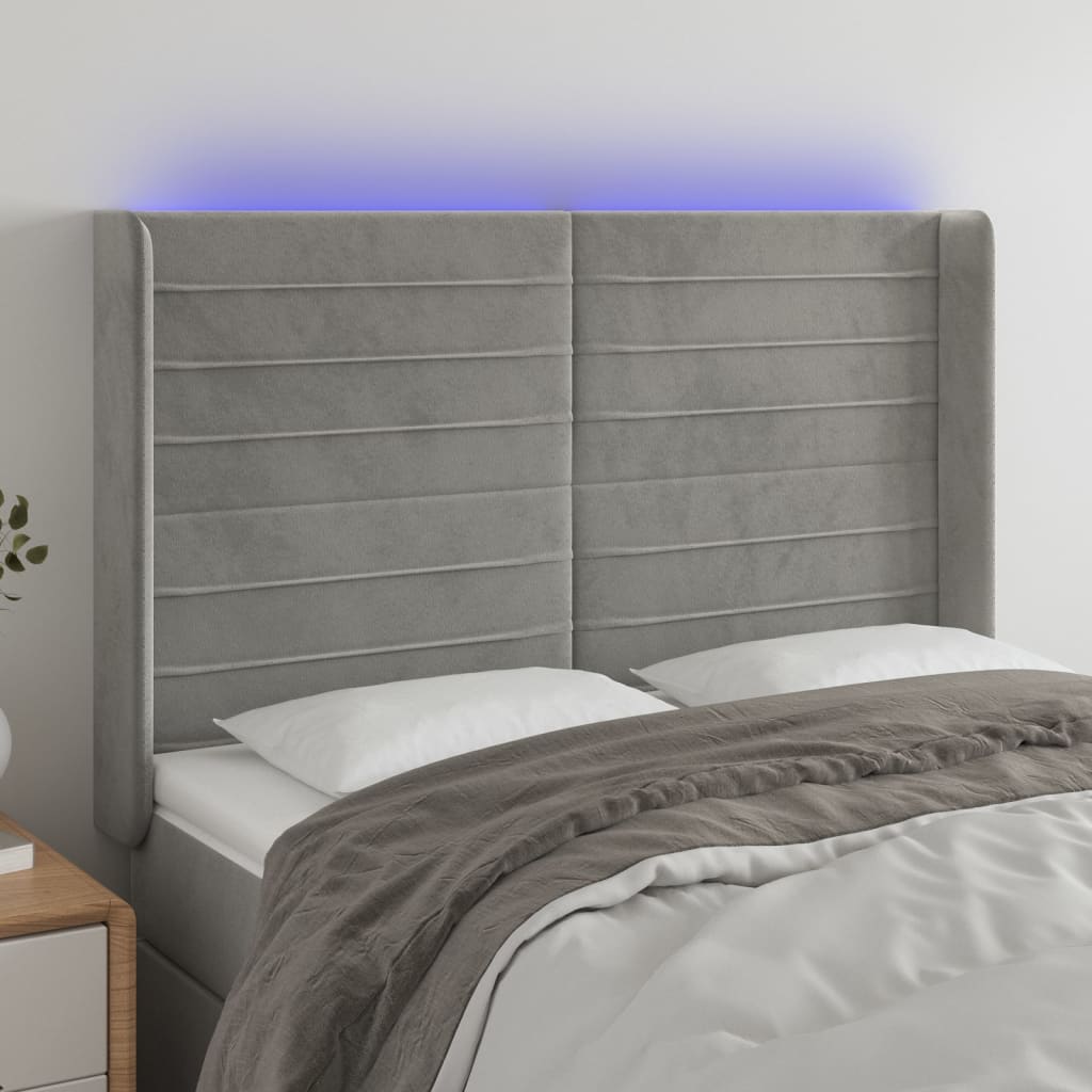 sengegavl med LED-lys 147x16x118/128 cm fløjl lysegrå
