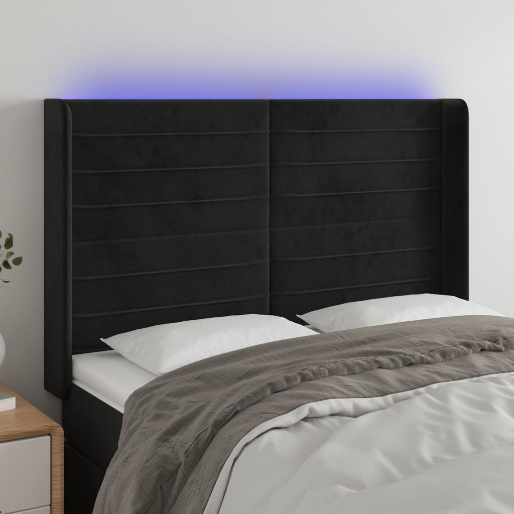 sengegavl med LED-lys 147x16x118/128 cm fløjl sort
