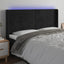 sengegavl med LED-lys 163x16x118/128 cm fløjl sort