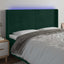 sengegavl med LED-lys 163x16x118/128 cm fløjl mørkegrøn