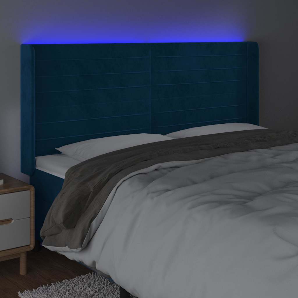 sengegavl med LED-lys 163x16x118/128 cm fløjl mørkeblå