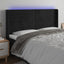 sengegavl med LED-lys 183x16x118/128 cm fløjl sort
