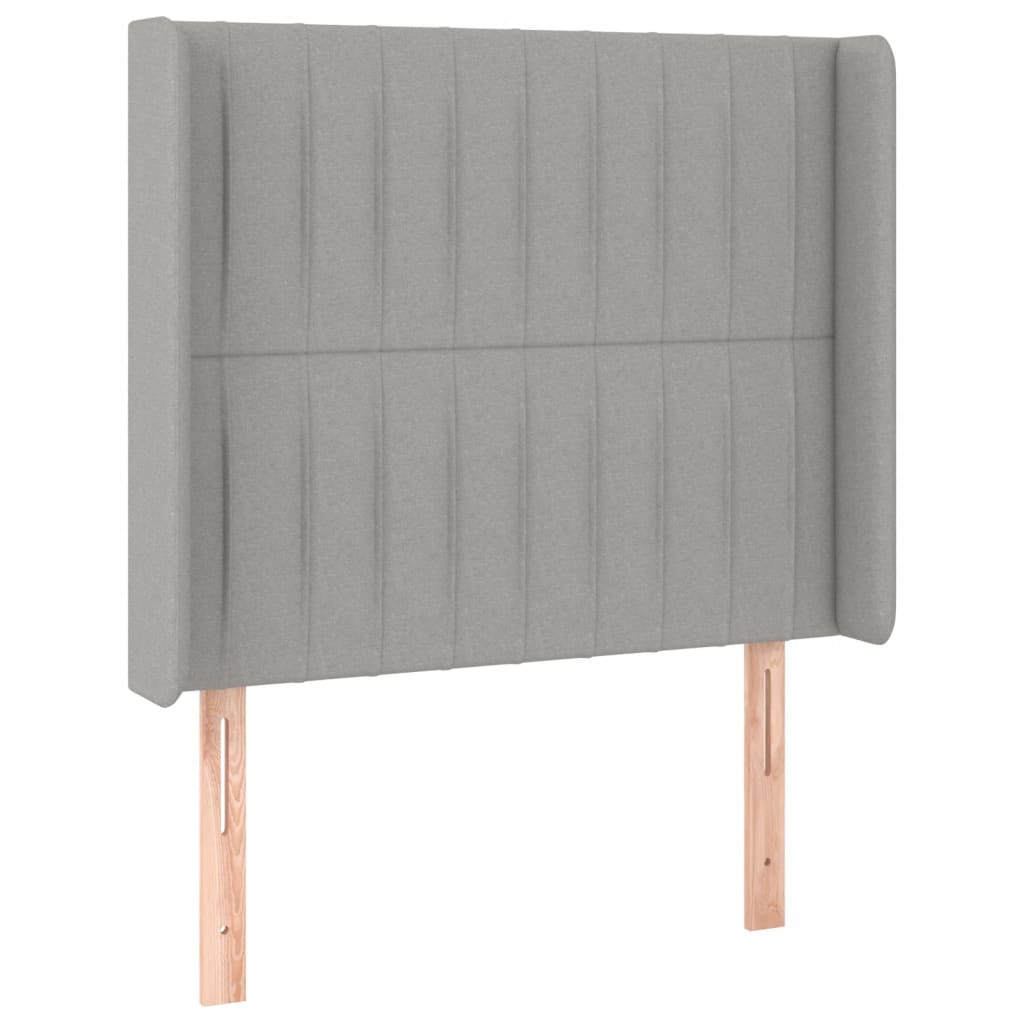 sengegavl med LED-lys 83x16x118/128 cm stof lysegrå