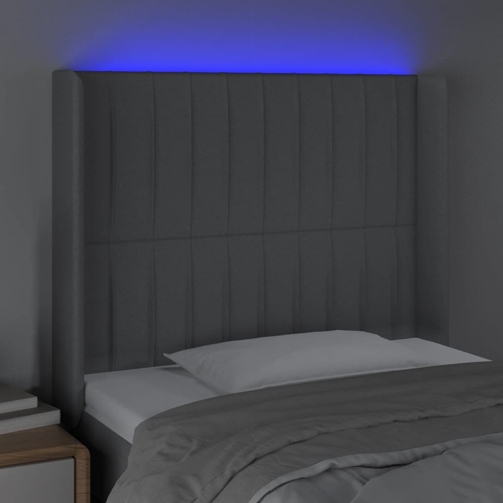 sengegavl med LED-lys 83x16x118/128 cm stof lysegrå