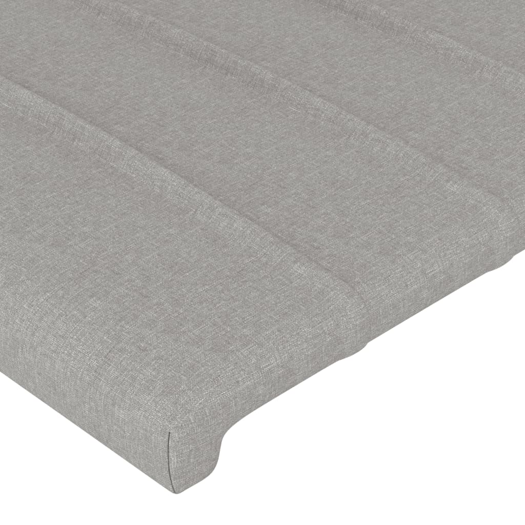 sengegavl med LED-lys 93x16x118/128 cm stof lysegrå