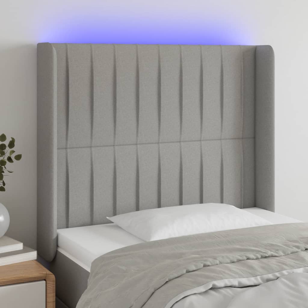 sengegavl med LED-lys 93x16x118/128 cm stof lysegrå