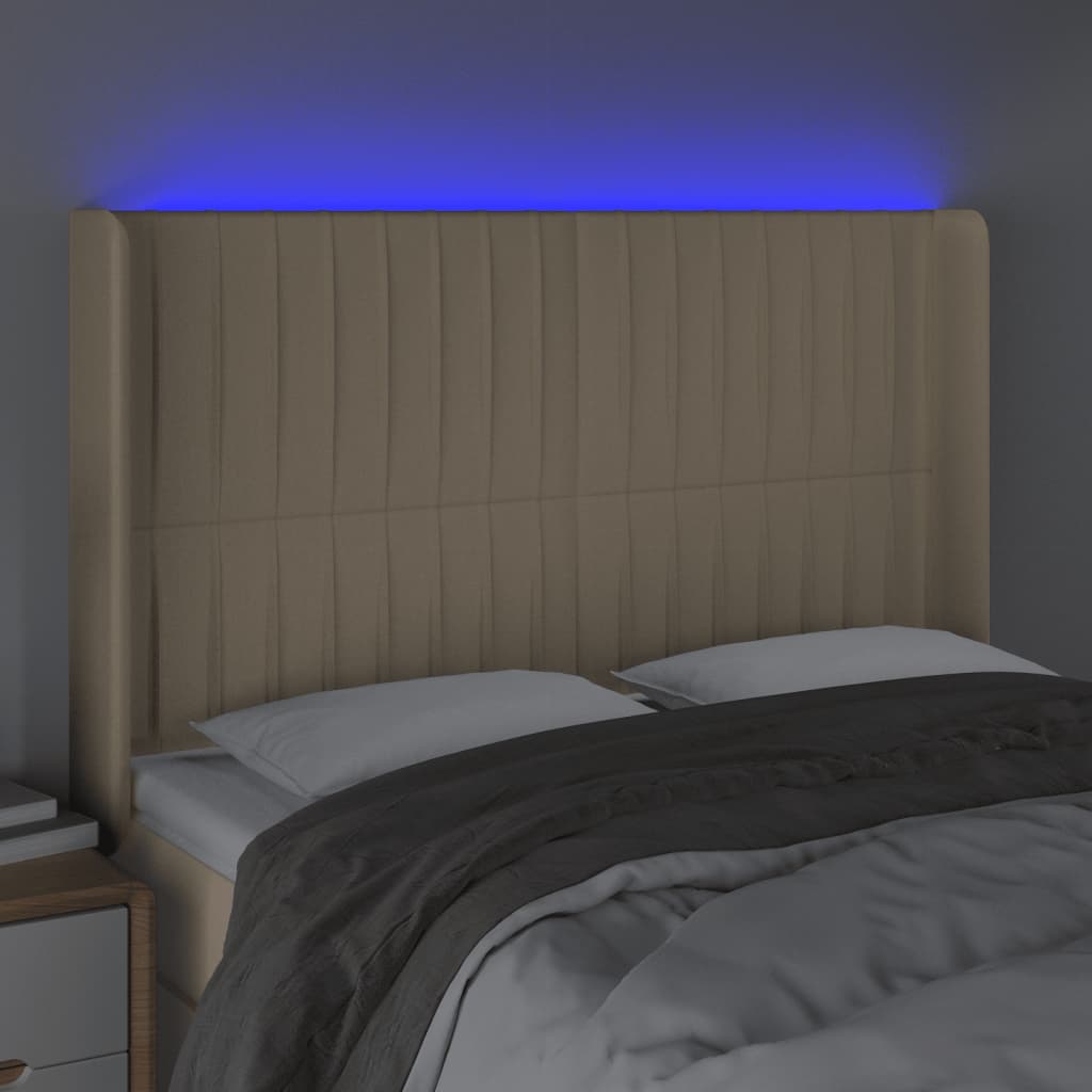sengegavl med LED-lys 147x16x118/128 cm stof cremefarvet