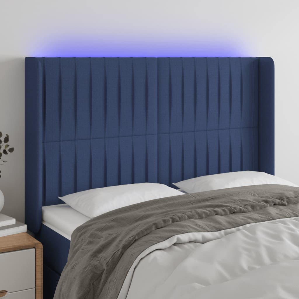 sengegavl med LED-lys 147x16x118/128 cm stof blå