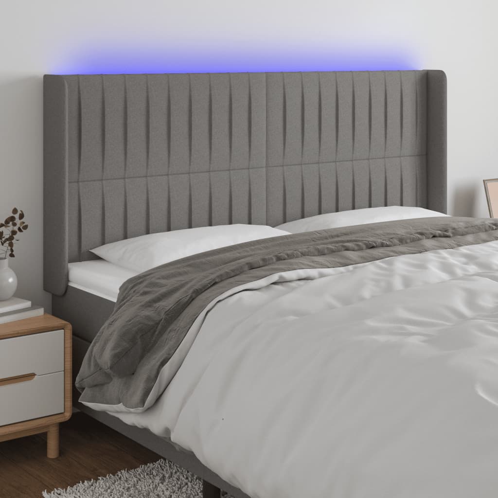 sengegavl med LED-lys 163x16x118/128 cm stof mørkegrå