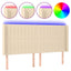 sengegavl med LED-lys 163x16x118/128 cm stof cremefarvet