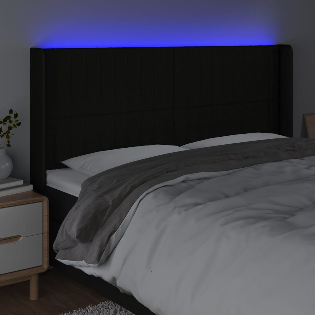 sengegavl med LED-lys 183x16x118/128 cm stof sort