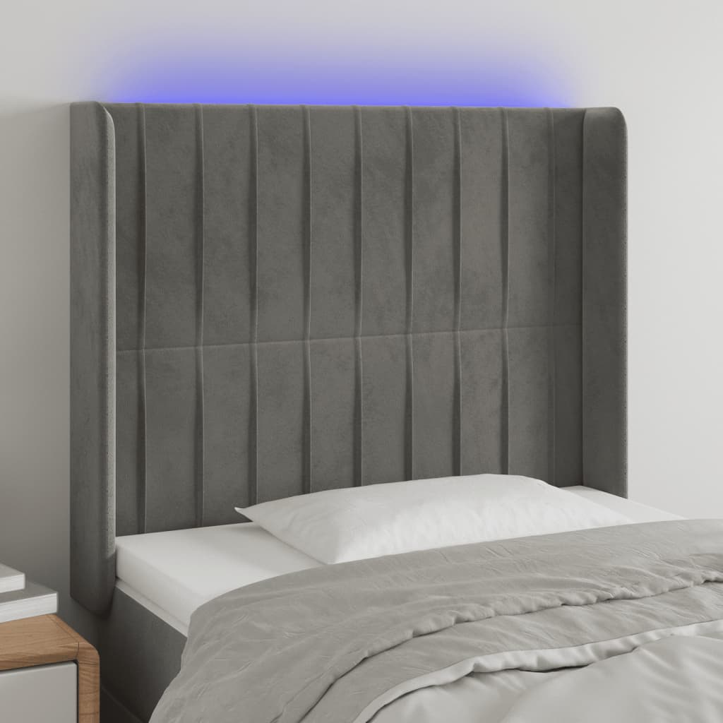 sengegavl med LED-lys 83x16x118/128 cm fløjl lysegrå