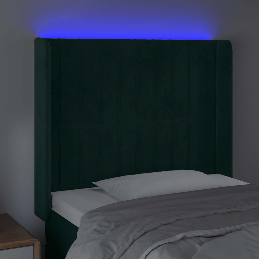 sengegavl med LED-lys 83x16x118/128 cm fløjl mørkegrøn
