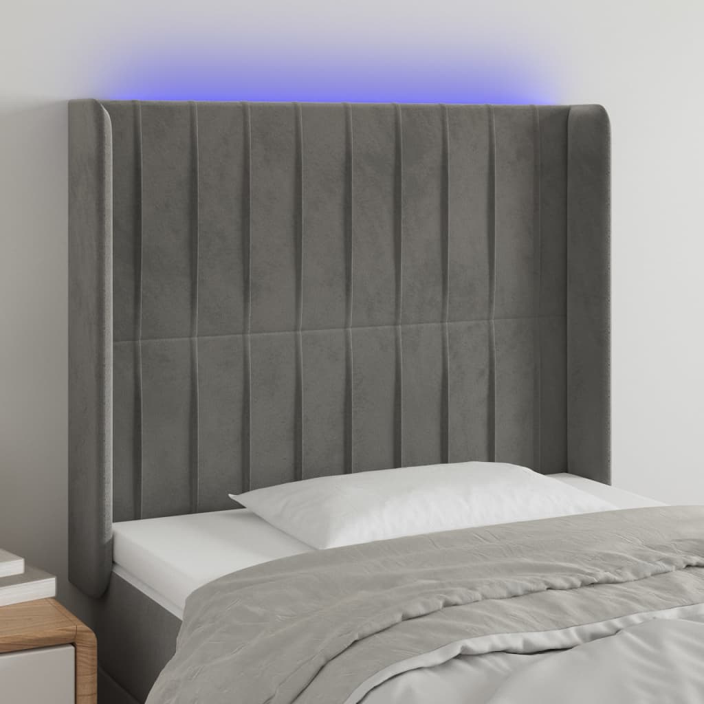 sengegavl med LED-lys 103x16x118/128 cm fløjl lysegrå
