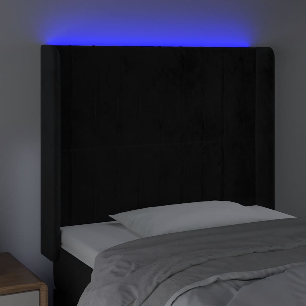 sengegavl med LED-lys 103x16x118/128 cm fløjl sort