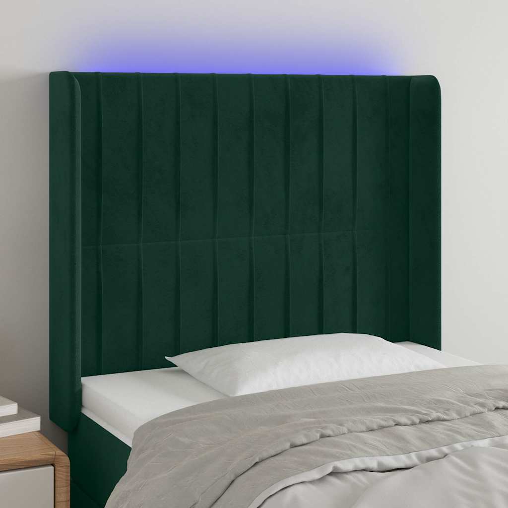 sengegavl med LED-lys 103x16x118/128 cm fløjl mørkegrøn
