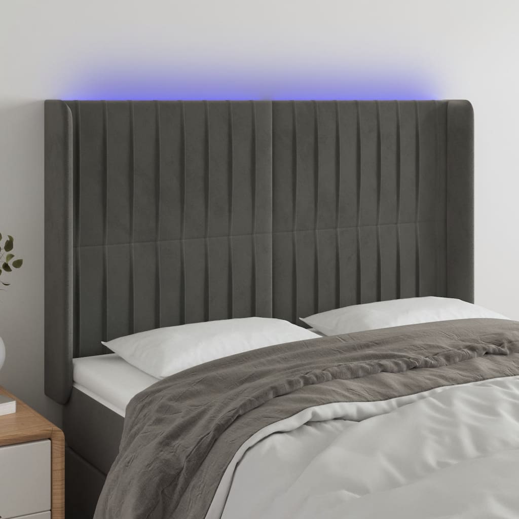 sengegavl med LED-lys 147x16x118/128 cm fløjl mørkegrå