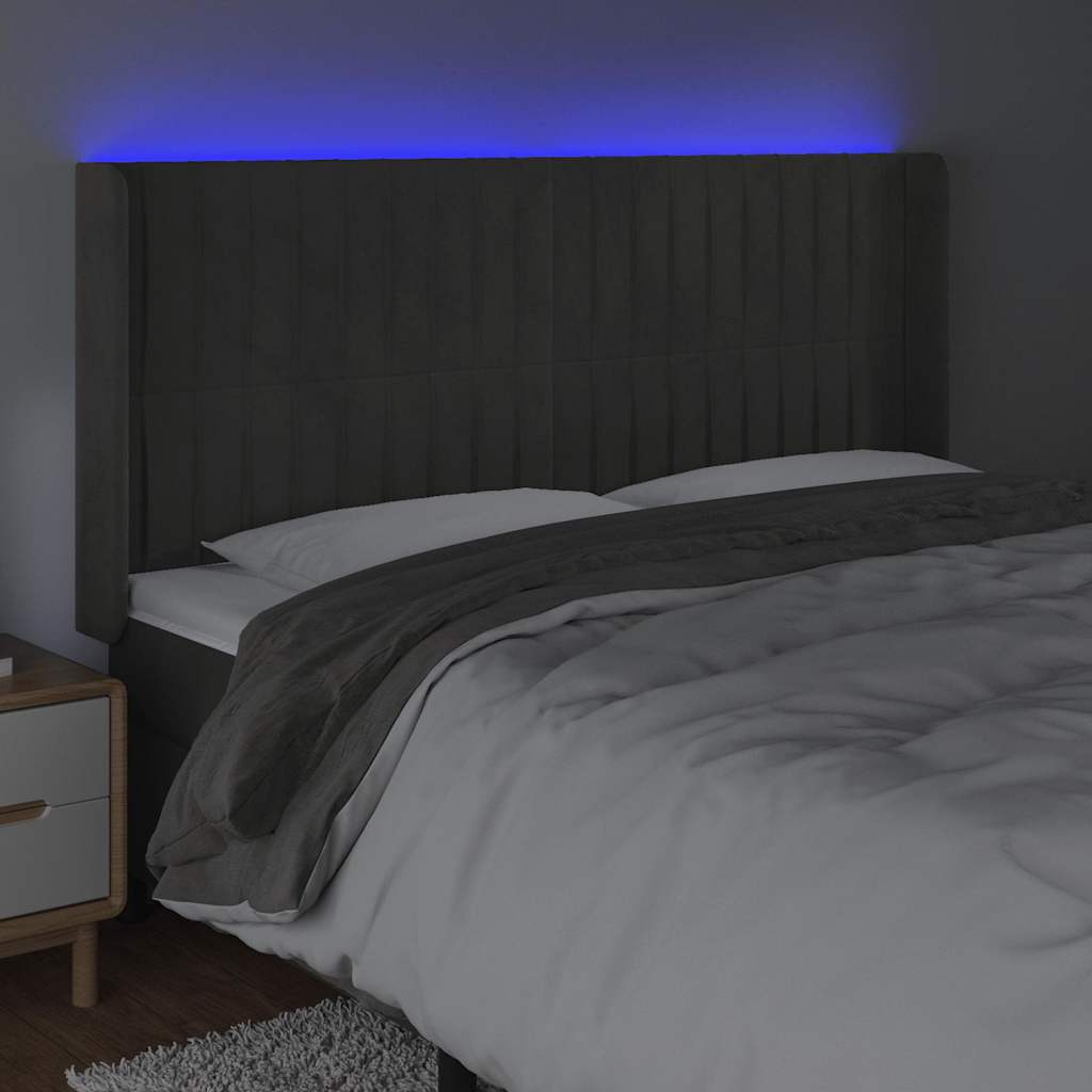sengegavl med LED-lys 163x16x118/128 cm fløjl mørkegrå