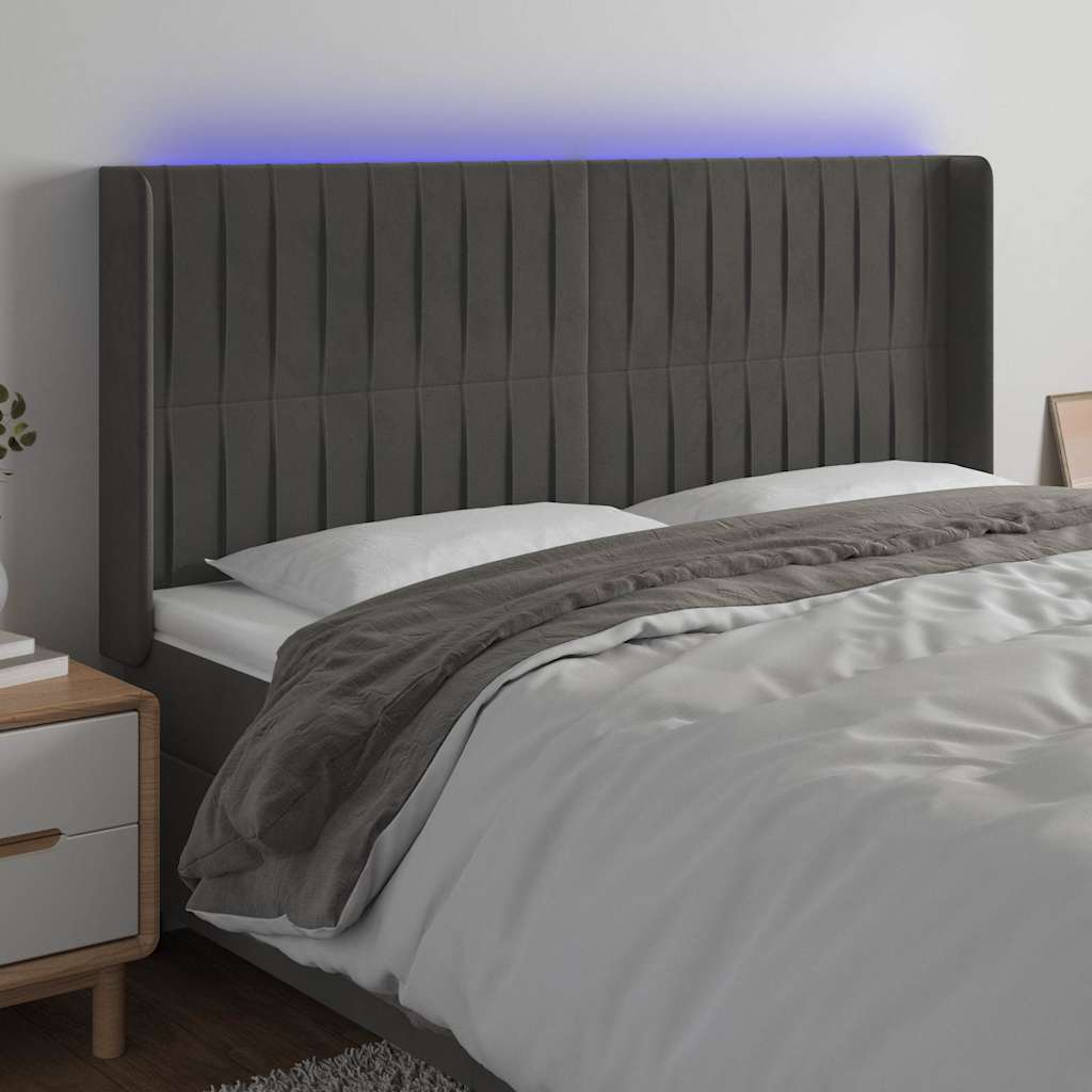 sengegavl med LED-lys 163x16x118/128 cm fløjl mørkegrå