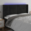 sengegavl med LED-lys 163x16x118/128 cm fløjl sort