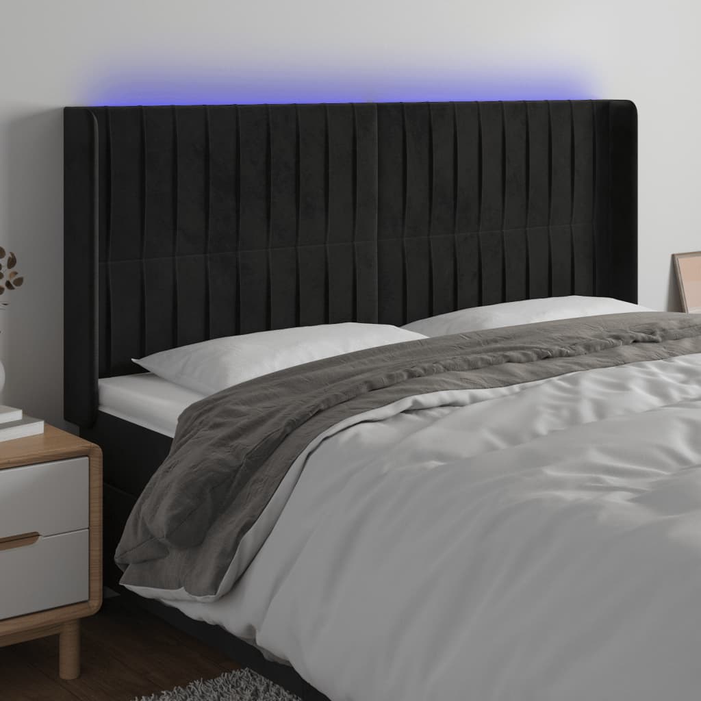 sengegavl med LED-lys 163x16x118/128 cm fløjl sort