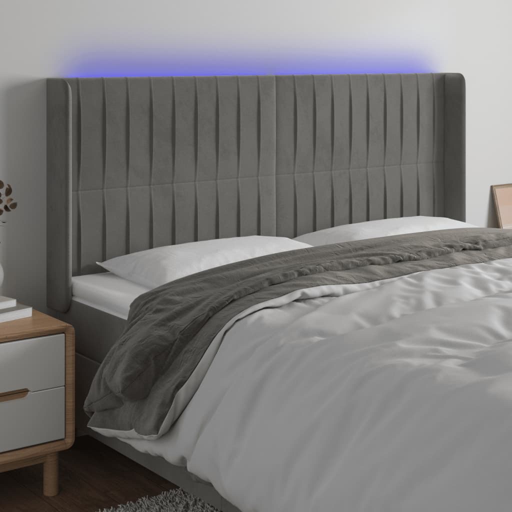 sengegavl med LED-lys 183x16x118/128 cm fløjl lysegrå