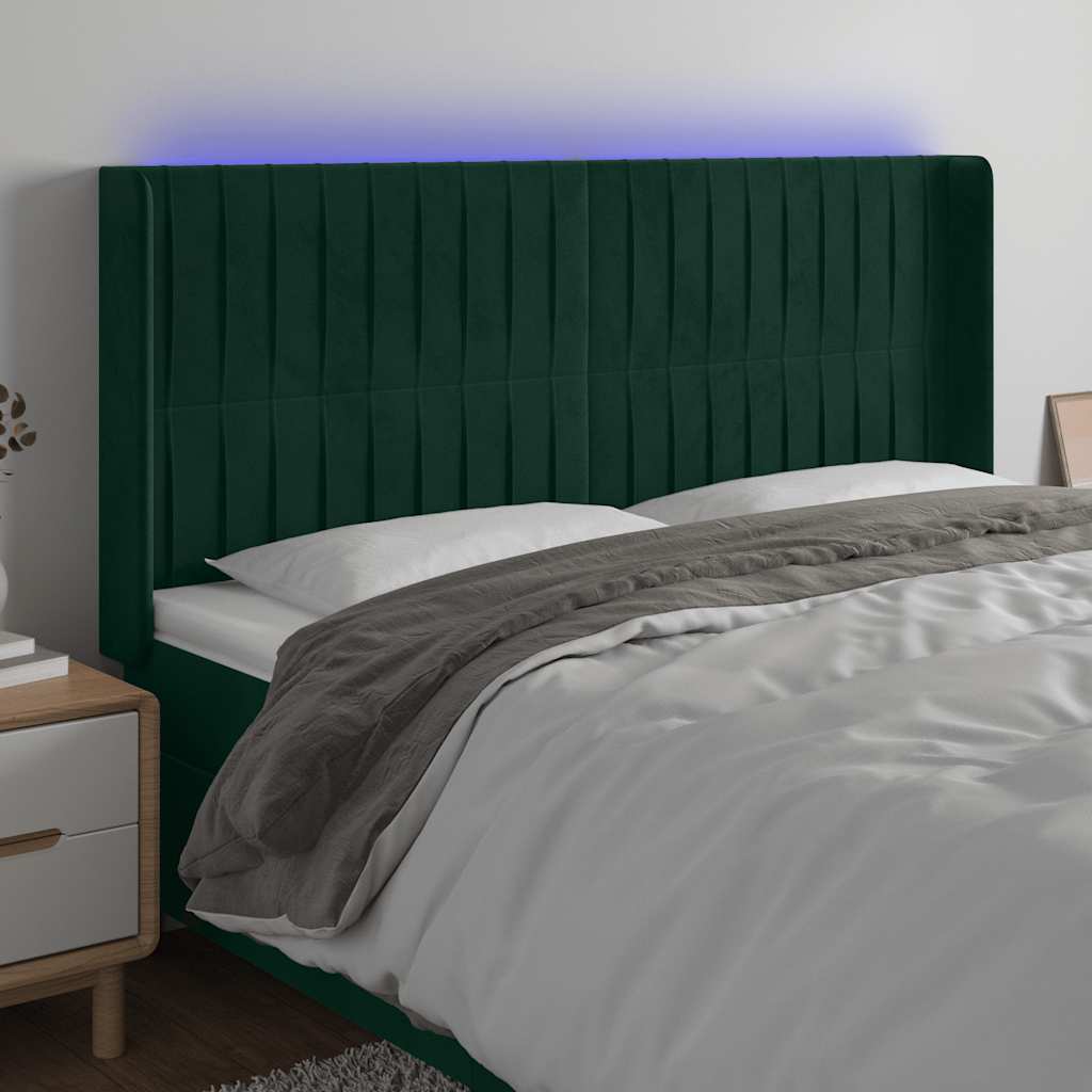 sengegavl med LED-lys 183x16x118/128 cm fløjl mørkegrøn