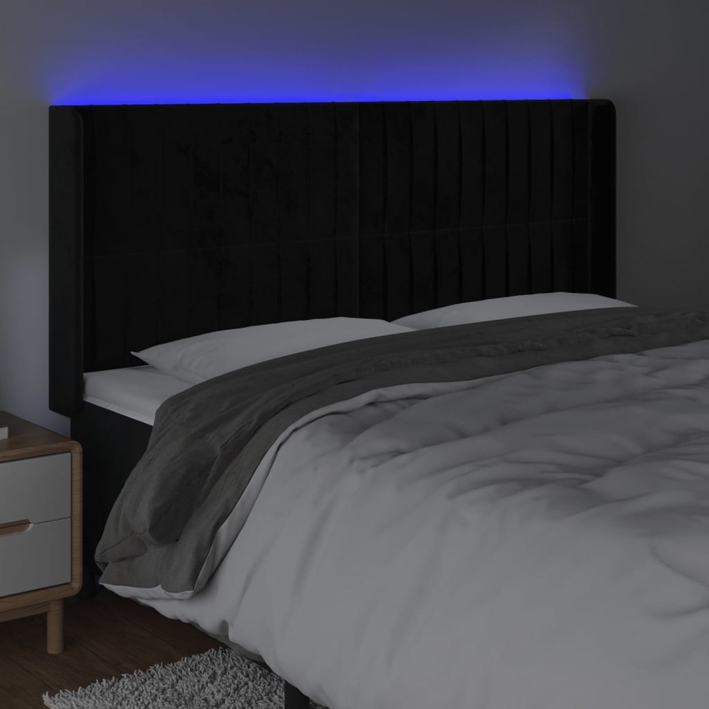 sengegavl med LED-lys 203x16x118/128 cm fløjl sort